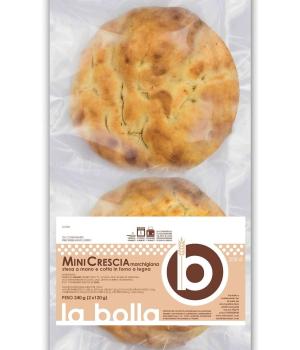 Two Mini crescia La Bolla spread by hand and cooked in a wood oven